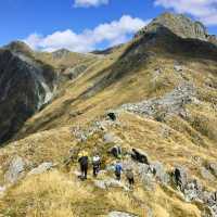Trekkers on the high alpine trails of Lake Nerine