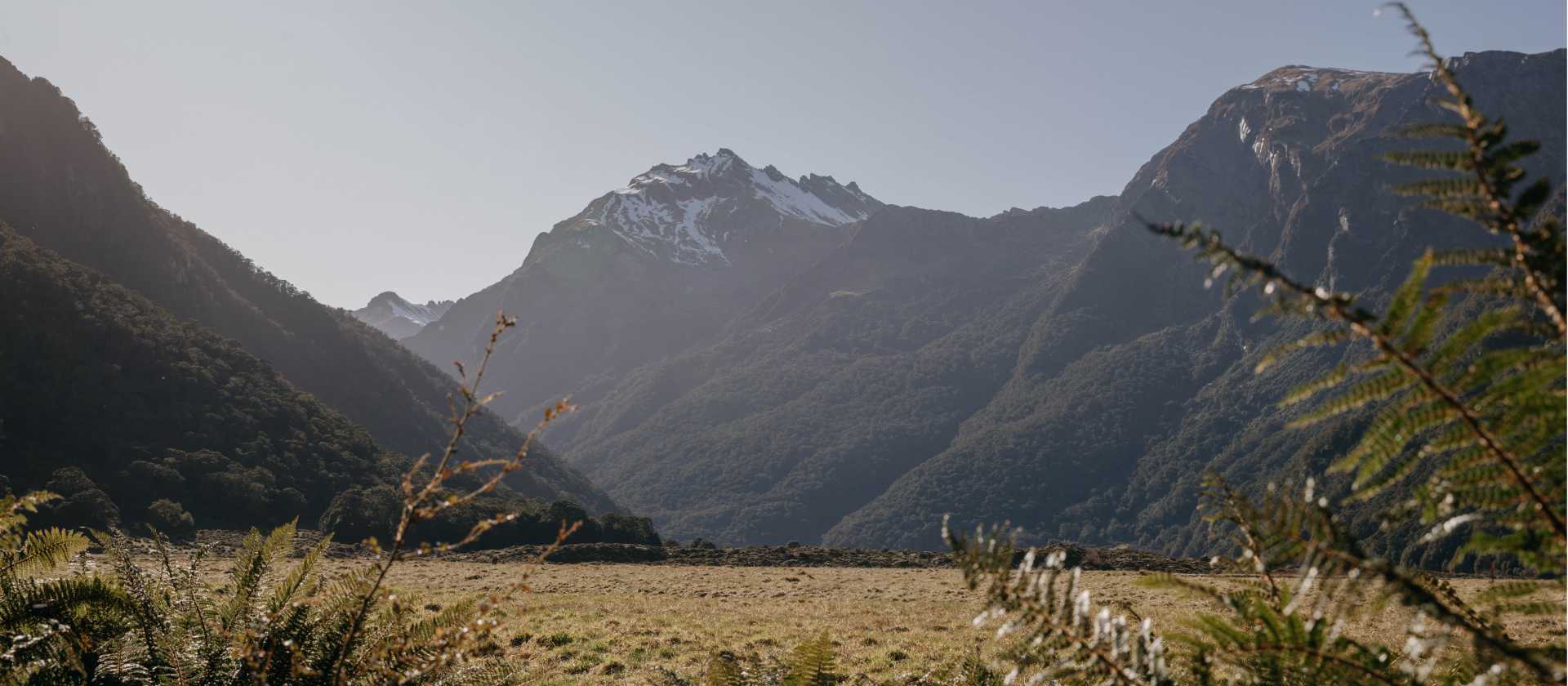 Walk through stunning valleys with towering mountains above on the Upper Wilkin