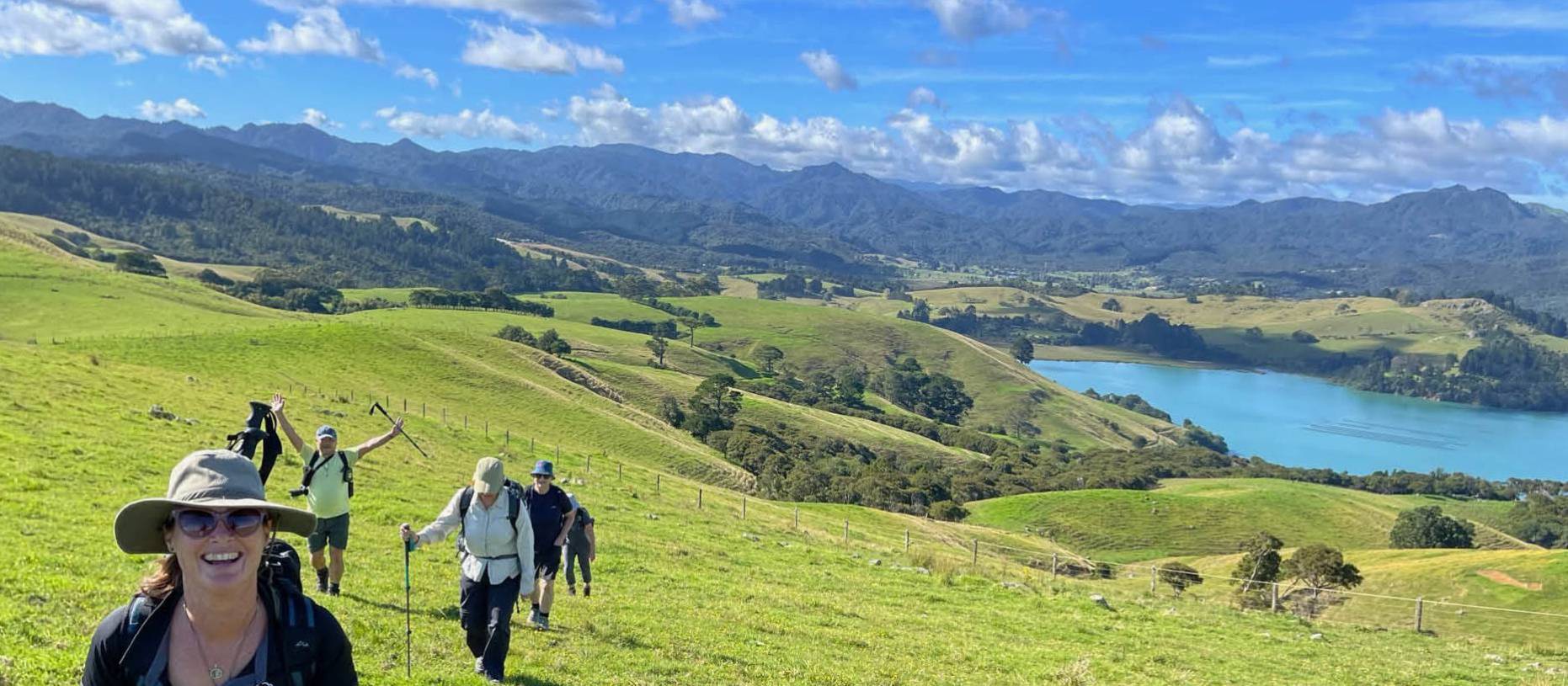 Walkers enjoying the Coromandel coastline