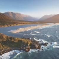 Aerial view over Long Reef and Martin's bay on the Fiordland, Hollyford and Stewart Island Trek | Hollyford Track