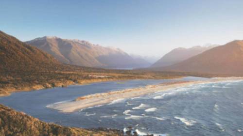 Aerial view over Long Reef and Martin's bay on the Fiordland, Hollyford and Stewart Island Trek | Hollyford Track