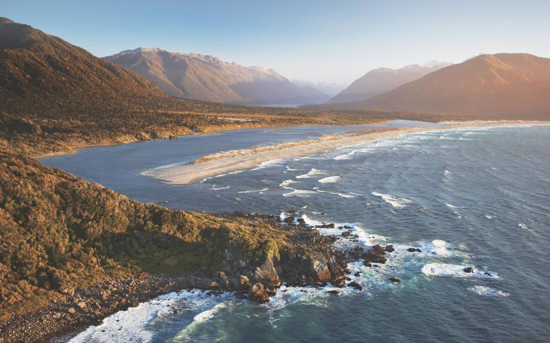 Aerial view over Long Reef and Martin's bay on the Fiordland, Hollyford and Stewart Island Trek |  <i>Hollyford Track</i>