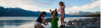 Kids enjoying playing along the shoreline at Lake Pukaki |  <i>Chanelle O'Sullivan</i>