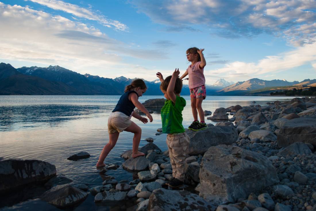 Kids enjoying playing along the shoreline at Lake Pukaki |  <i>Chanelle O'Sullivan</i>