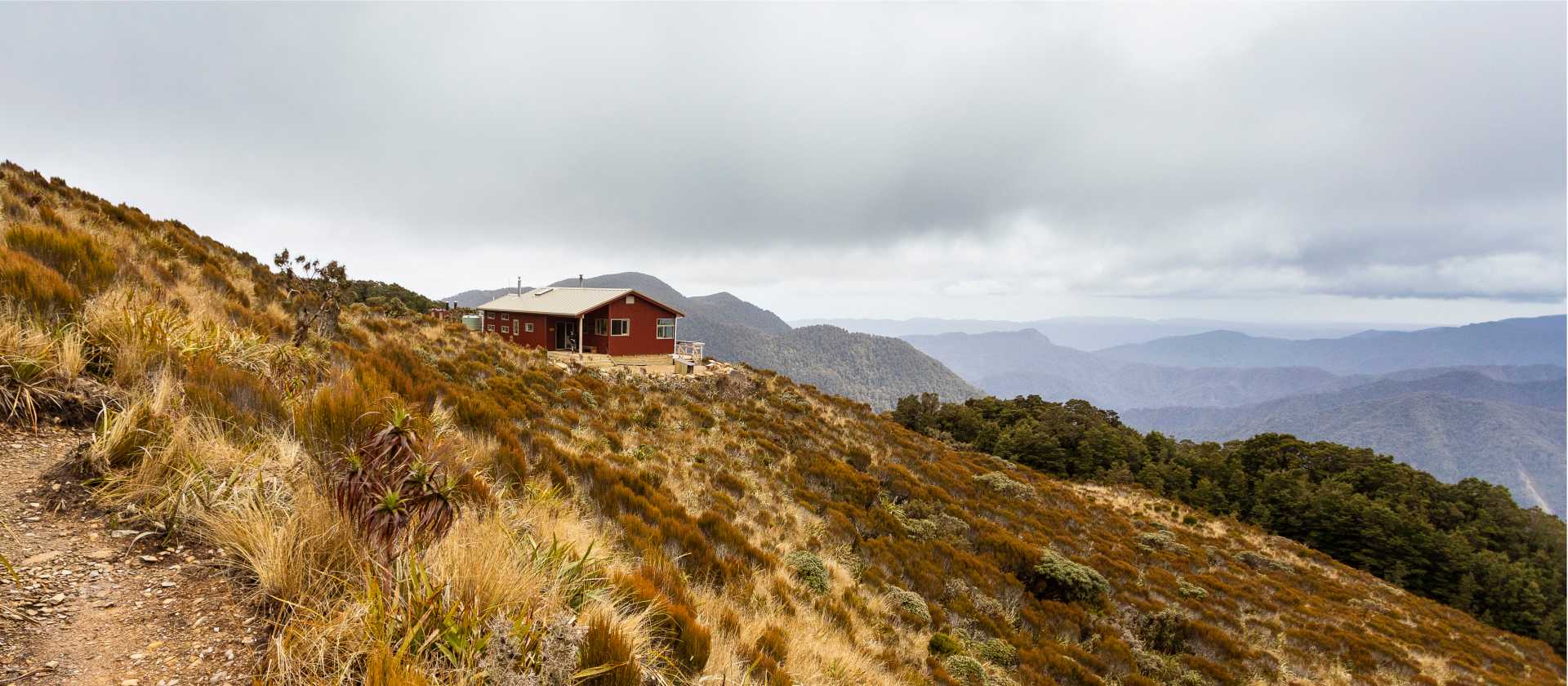 Moonlight Tops Hut with panoramic views across the Punakaiki River, Pike Stream and Paparoa National Park | Jase Blair (Tourism New Zealand)