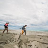 Walking along the sand dunes in Golden Bay. | Nelson Tasman Tourism