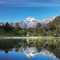 The still waters of Lake Alabaster, reflects Mt Madeline