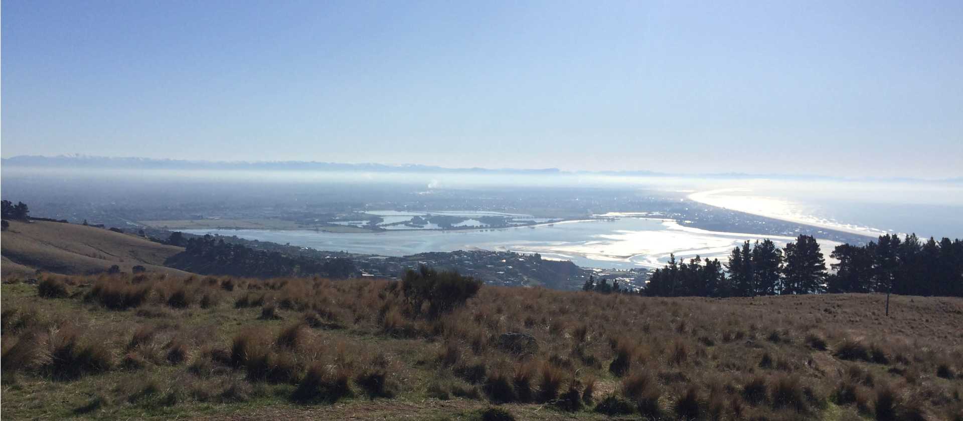 Sun shining over Christchurch from the Port Hills