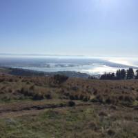 Sun shining over Christchurch from the Port Hills