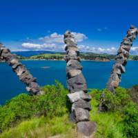 Chris Booth's stunning sculpture, Kaitiaki, leaning out from Rotoroa Island | Terra and Tide