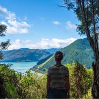 Stopping to admire the views along the Nydia Track | MarlboroughNZ