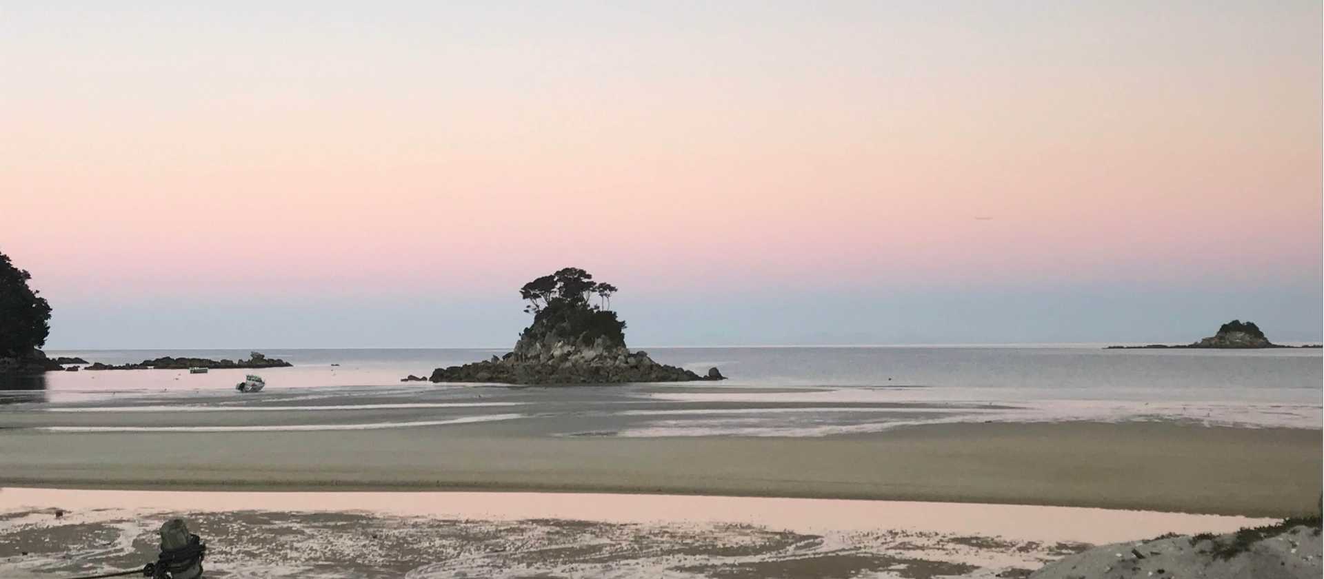 The pink dusky sky as sun sets over Torrent Bay | Janet Oldham