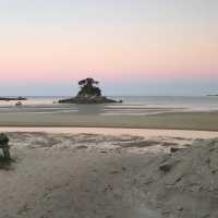 The pink dusky sky as sun sets over Torrent Bay | Janet Oldham