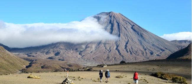 Walkers enjoying the barren lands of the Tongariro Alpine Crossing | David Tip